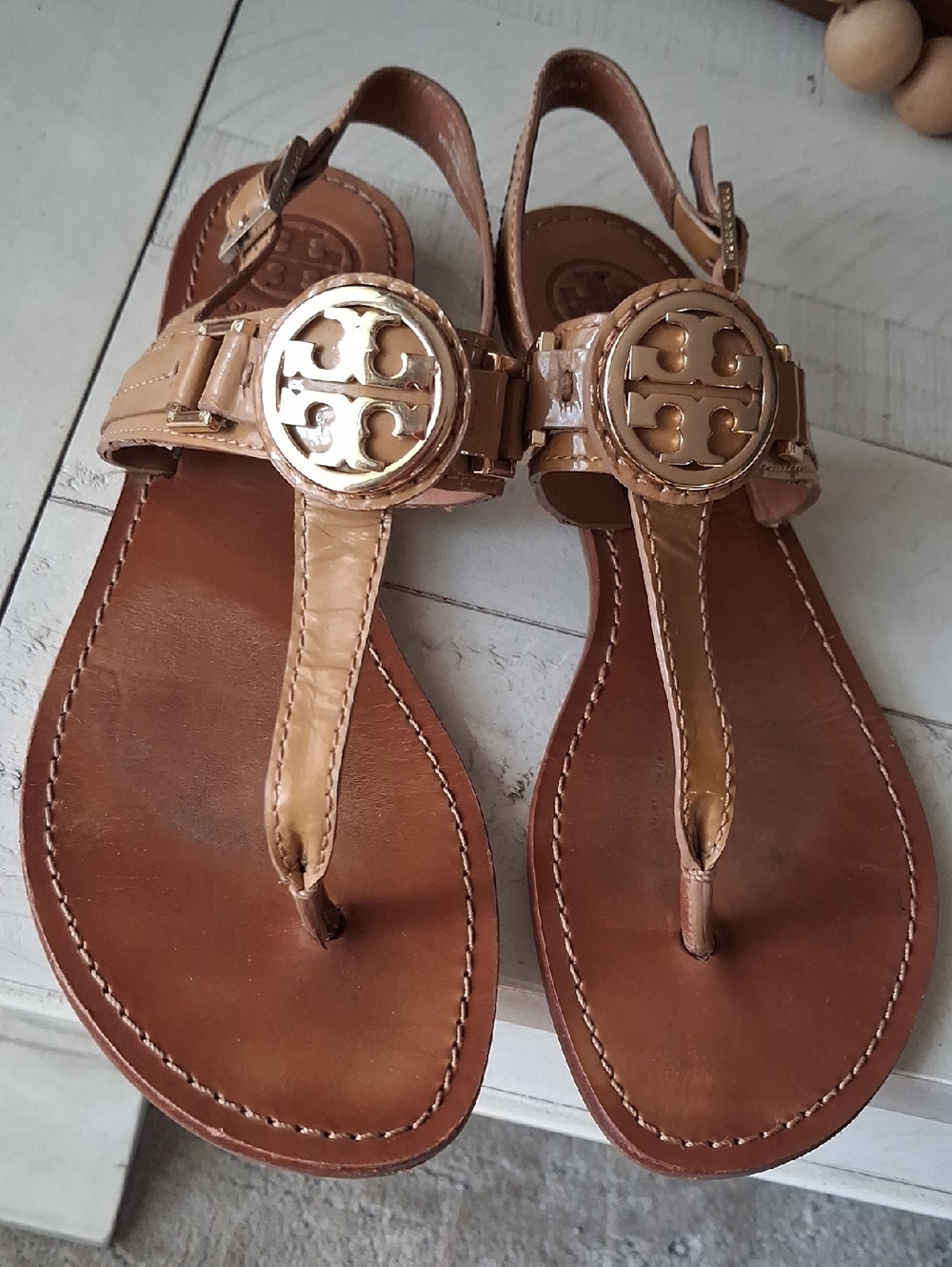 Tory Burch Nude Patent Leather Logo Thong Sandals with Gold Emblem